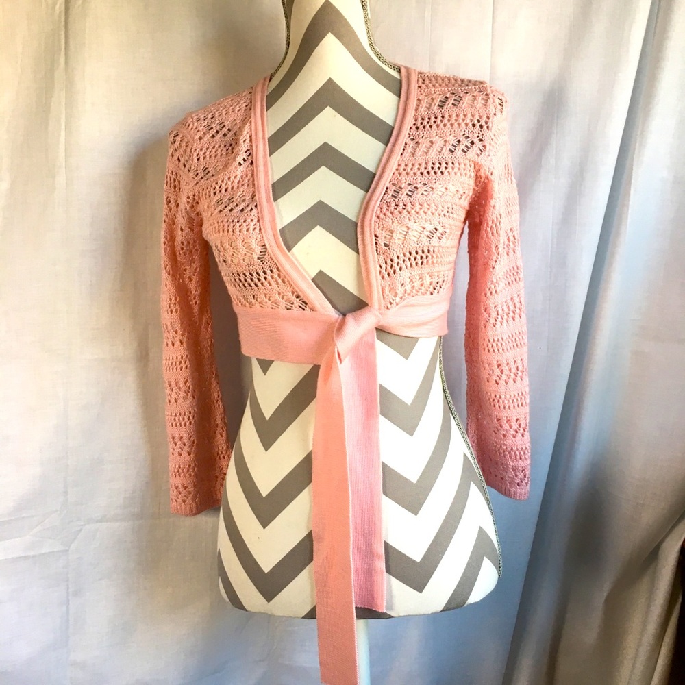 Armand and Alba pink crochet cardigan tie in front